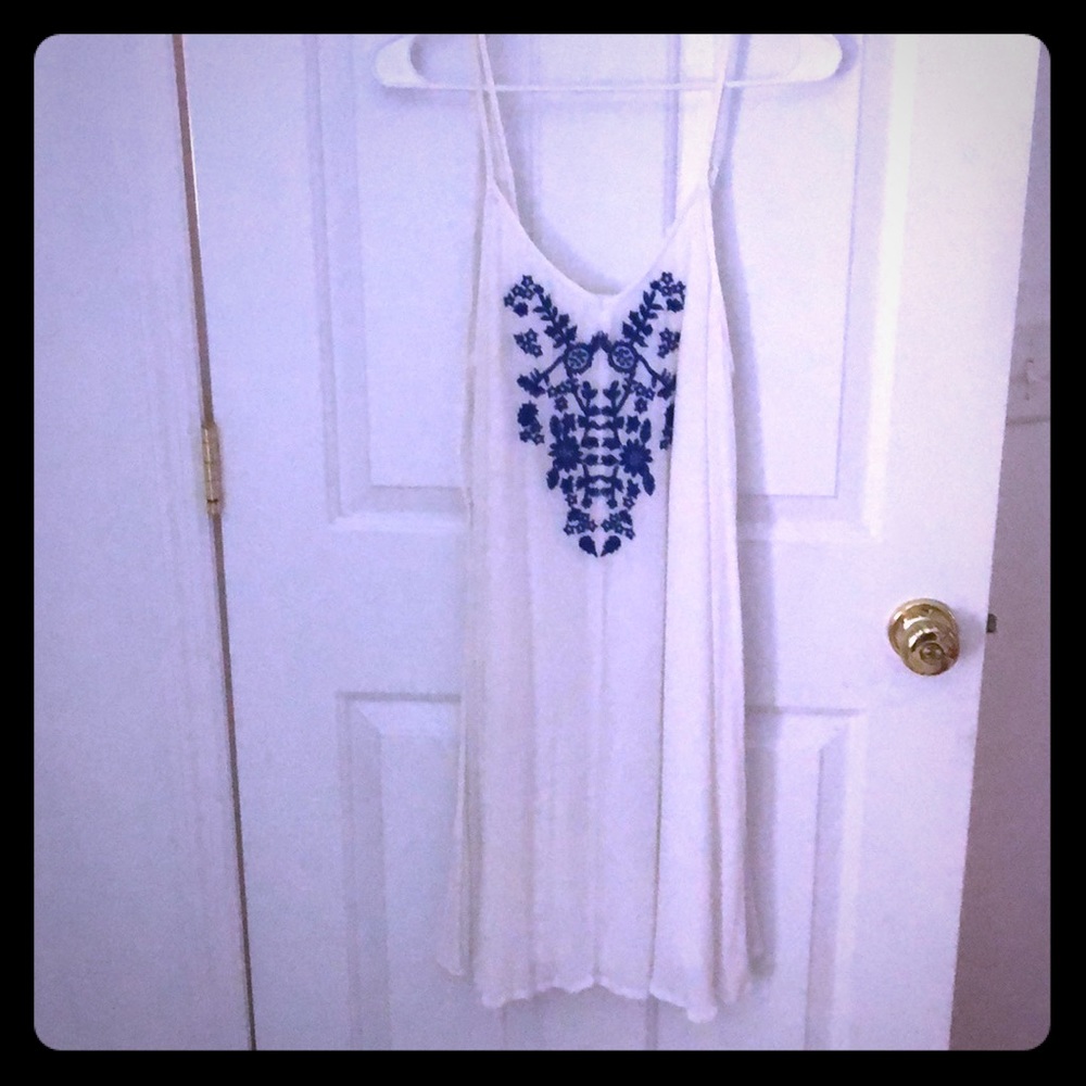 White with blue embroidery dress